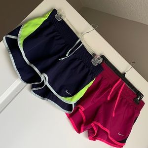 2 pairs of medium Nike shorts